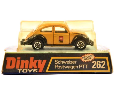 A Dinky Toys Schweizer Postwagen PTT (262). A late example in yellow and back livery, with opening doors, bonnet and bootlid.