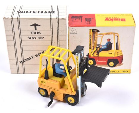 A scarce Dinky Toys Promotional Model. A Conveyancer Fork Lift Truck (404) in yellow and orange livery, complete with driver.