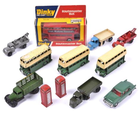 12 Dinky Toys vehicles. 2x Routemaster Bus (289). Both in red livery, one with 'Visit Madame Tussaud's' advertisements, the o