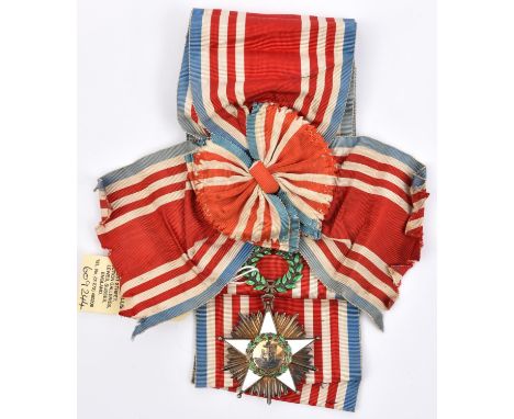 Liberia: Order of African Redemption sash and sash badge, in gilt with 5 pointed white enamelled cross supporting central dev