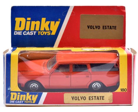 A scarce late Dinky Toys Volvo 265DL Estate (180). An Italian produced example painted in orange, with a black plastic base p