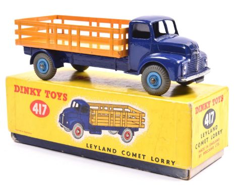 Dinky Toys Leyland Comet Lorry (417). An example in dark blue with deep yellow rear body and mid blue wheels with grey tyres,