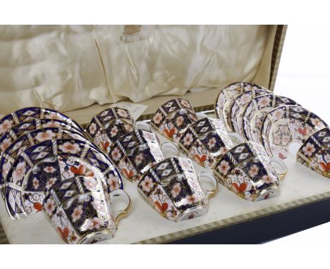 ATTRACTIVE ROYAL CROWN DERBY 'OLD IMARI' PATTERN COFFEE SERVICEcomprising eight cups and saucers, the cups of tapering octago