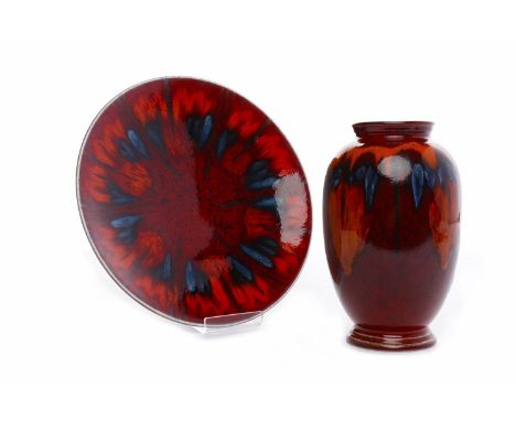 POOLE POTTERY FLAMBE VASE AND CHARGERthe vase of oviform, with mottled glaze predominantly in red, orange and blue, printed d