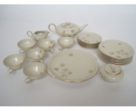 An early 20th Century KPM 'Krister' teaset for six, comprising teapot and cover, sugar bowl and cover, milk jug, cake plate, 
