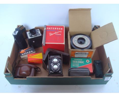 An MPP microcord camera in leather case together with a small quantity of cameras and related developing equipment. 