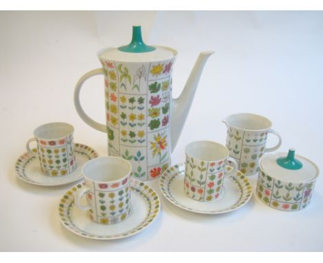 A Rosenthal Studio Line part coffee set comprising coffee pot, milk jug, sugar bowl and cover and three coffee cans and sauce