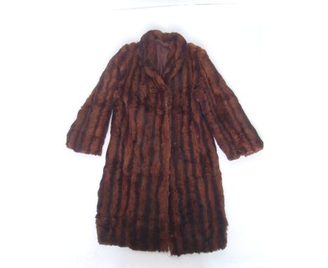 A vintage ladies full length rabbit fur coat.  
