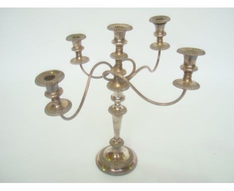 An Old Sheffield Plate five light candelabrum, with central light and four scrolled branches, on tapering stem and weighted c