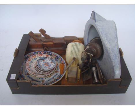 A mixed lot, comprising a 19th Century salter brass meat jack, Makkum faience plates, a wall mounted ceramic coffee bean grin