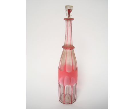 A 19th Century cranberry flashed clear glass decanter and stopper, 38cm.   