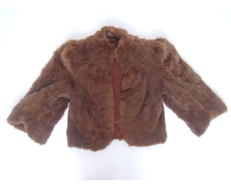 A Vintage Ladies rabbit fur evening jacket.
