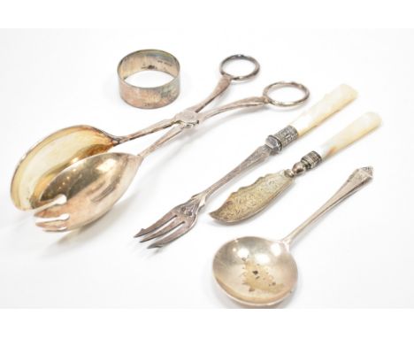 A collection of antique silver and silver plated wares. The lot to include a hallmarked silver spoon (hallmarked Sheffield 19