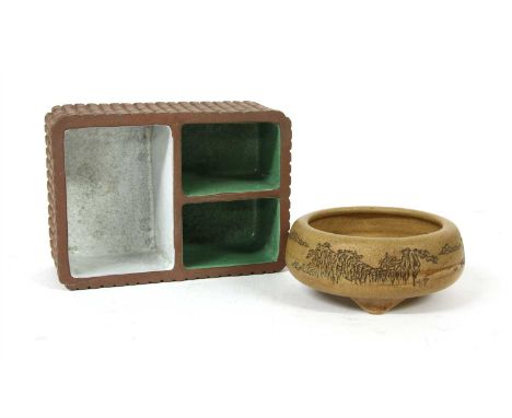 A Chinese Yixing zisha brush washer , of circular form with curled rim on three splayed feet, incised with a continuous lands