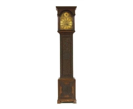 An 18th century eight day longcase clock by George Stevens, the arched brass dial with subsidiary seconds dial and date apert
