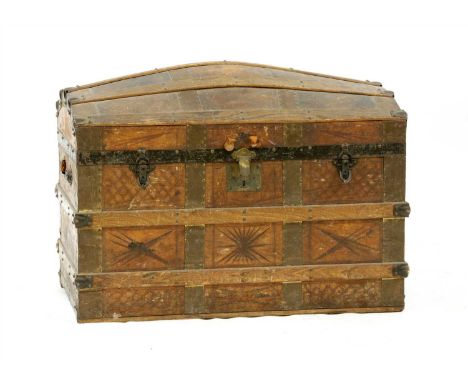 A dome top travelling trunk, with a fitted interior, 93cm wide, 53cm deep, 70cm high