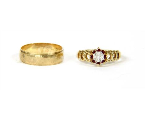 A 9ct gold diamond and ruby illusion set cluster ring , London 1980 and a 9ct gold wedding ring, F/S I/2, KLE, 4.05g