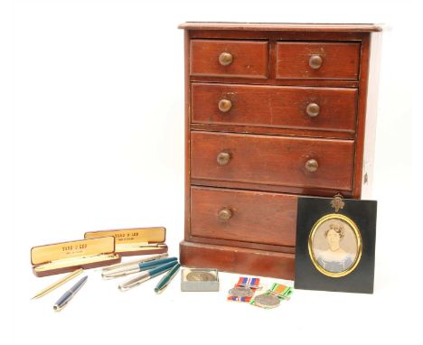 A 19th century mahogany apprentice chest of five drawers, 38cm high, together with a miniature portrait of an elderly lady an