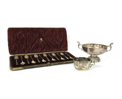 An early 20th century French silver twin handled pedestal bowl by Marc Parrod Design, together with a cased set of twelve sil