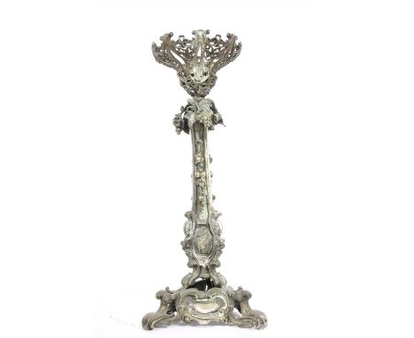 A silver plated Rococo style lamp base, 19th century, the column set with grapes, leaves and vines, above a scrolling tripart