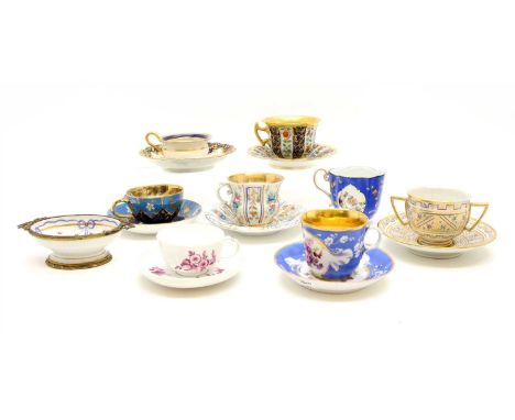 A Moscow cabinet cup and saucer, Alexander Popoff factory, of faceted form with gilt and hand painted floral decoration, toge