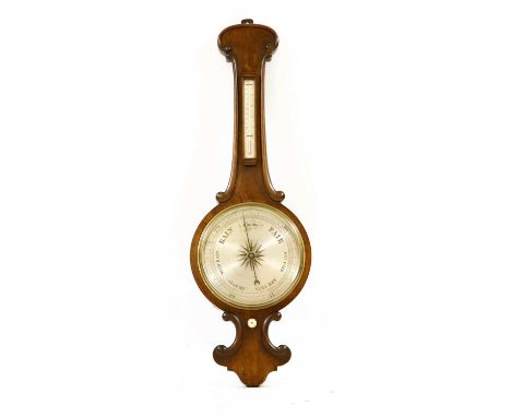 A large 19th century walnut wheel barometer, with oversized silvered dial fitted thermometer, 30.5cm diameter of dial