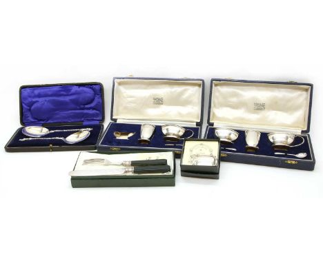 A collection of silver items, to include two Garrard &amp; Co cased condiment sets, cased apostle spoons by Harrison Brothers