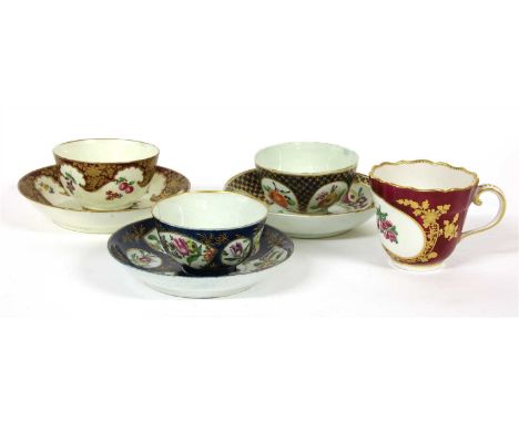 A Worcester tea bowl and saucer, 18th century, red crescent mark to base (af), two further examples and a cup (4)