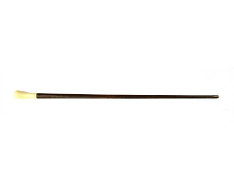 A Japanese ivory and hardwood walking stick , Meiji period, the handle with insect decoration, above a turned tapering shaft,