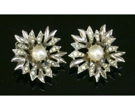 A pair of Christian Dior by Mitchel Maer simulated pearl and paste earrings, c.1950, claw set to the centre. Spikey petals se