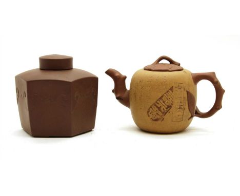 A Chinese Yixing zisha tea caddy , of hexagonal form on three bracket feet, moulded with ruyi heads, 11.5cm high, and a tea p