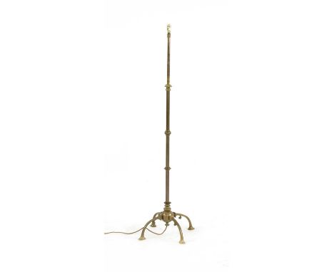 An Arts &amp; Crafts brass standard lamp, late 19th early 20th century and later, in the manner of WAS Benson, with a section