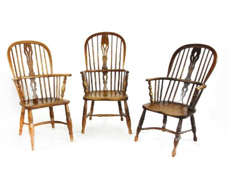 Three 19th century Windsor double bow back armchairs