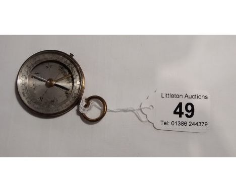 Old brass pocket compass
