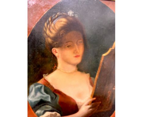 An early 20th Century portrait of a lady looking into a mirror, oil on canvas, framed