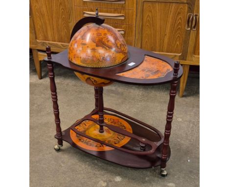 An Italian style terrestrial globe cocktail trolley/cabinet 