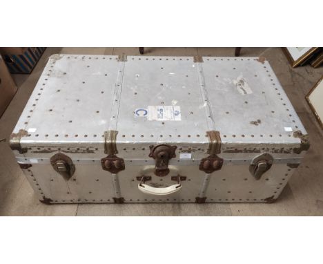A metal steamer trunk bearing, M.S Achille Lauro shipping label