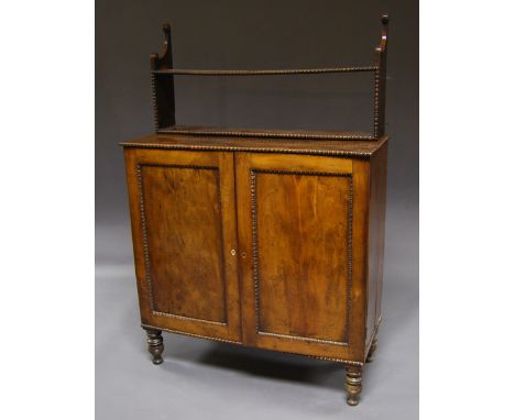 An early Victorian yew wood collectors' cabinet, circa 1840, the pair of drawers enclosing shallow specimen drawers, 95 x 94 