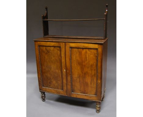 An early Victorian yew wood collectors' cabinet, circa 1840, the pair of drawers enclosing shallow specimen drawers, 95 x 94 