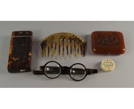 A Victorian tortoiseshell cigar case, moulded with a Gothic building, 13cm high, a pair of tortoise shell glasses, a Chinese 