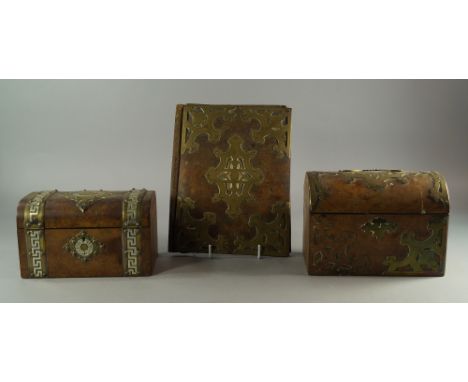 A Victorian brass bound and walnut tea caddy, 21cm wide, together with a similar stationary box and a blotter cover(3)