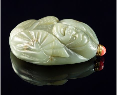 A Chinese jade snuff bottle, 20th century, in the form of a man holding a fan, possibly previously a pendant, 8cm high CONDIT