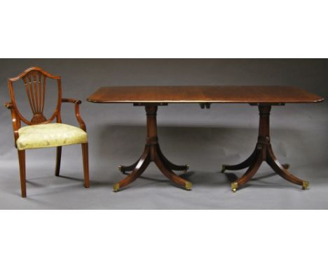 A Regency style mahogany and burr pedastal table, late 20th century, shaped rectangular top, raised on tripod legs, together 