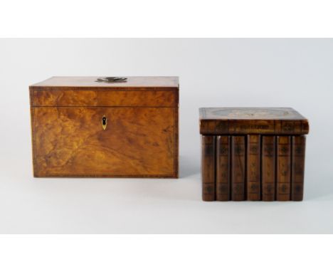 A rectangular walnut tea caddy, late 18th/19th century, with navette escutcheon and handle, the edges of banded form, 23cm wi