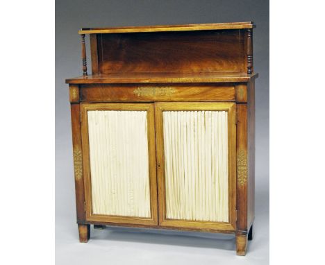 A Regency rosewood brass inlaid chiffonier, shelf superstructure on turned supports, overall brass inlaid and strung, with tw