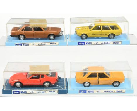 Schuco a group of 1/43 Scale cars to include (1) 302 630 VW Passate "Variant" ADAC; (2) Zerlegbar&nbsp; 301 610 Audi 80 LS pl