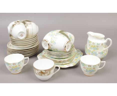 A Jason china six place tea set and a Noritake china part tea set.