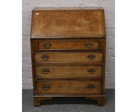 A burr walnut bureau crossbanded in mahogany with fitted interior, raised on bracket feet, 74cm width, 44cm depth, 99cm heigh