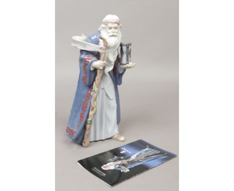 A Lladro millennium figure Father Time, approximately 27cm height.Condition report intended as a guide only.Good condition.