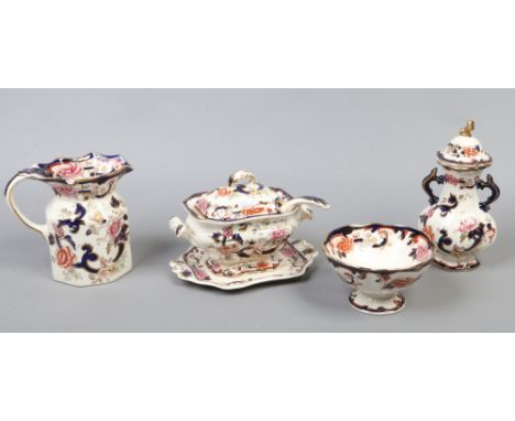A quantity of Masons ironstone pottery in the Mandalay design including twin handle vase, soup tureen, water jug etc.Conditio